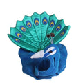 Peacock-themed headband with blue glittery base and green feathers on a white background